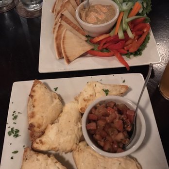 The Curragh - Seafood bruschetta and hummus platter appetizers - Irish Near Me - Holland, Michigan