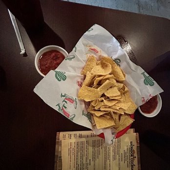 Salvador Cocina - a plate of nachos and a drink - Mexican Near Me - Durant, Oklahoma Salvador Cocina - a plate of nachos and a drink - Mexican Near Me - Durant, Oklahoma