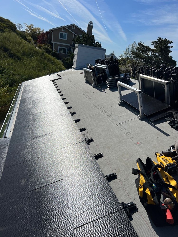 Slide of Wick's Roofing