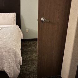 Staybridge Suites San Angelo - Barely wide enough for a wheelchair, the bathroom door opens the wrong way