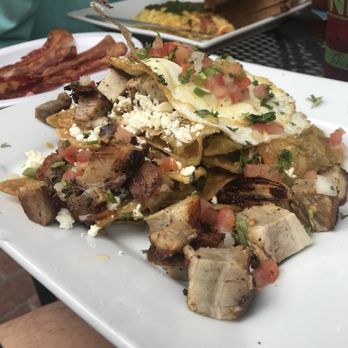 The Crema Cafe - Chilaquiles with pork belly (usually comes with carnitas) - Bakeries Near Me - Seal Beach, California