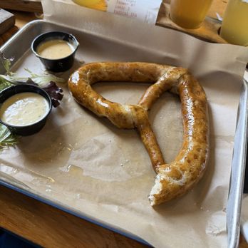 Antimony Brewing - The pretzel, oops I took a piece! Delicious - Bars Near Me - Lenox, Massachusetts