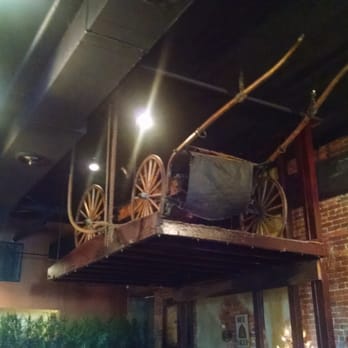 Brickyard Cafe - inside dining room adjacent to bar with more tables and I believe, a private area in the back - Italian Near Me - Franklin, Kentucky