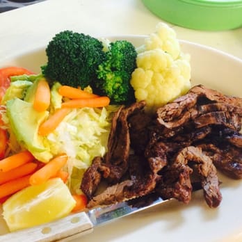 Trigos Mexican - a plate of meat, vegetables, and rice - Mexican Near Me - Houston, Texas Trigos Mexican - a plate of meat, vegetables, and rice - Mexican Near Me - Houston, Texas