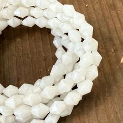 Gilding the Lily - Vintage French glass beads, faceted bicones in white with nuance...