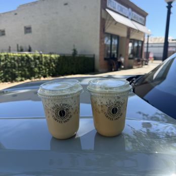 Full Circle Coffee House - Golden honey pistachio cold brew pictured in front of building. - Coffee & Tea Near Me - Yuba City, California