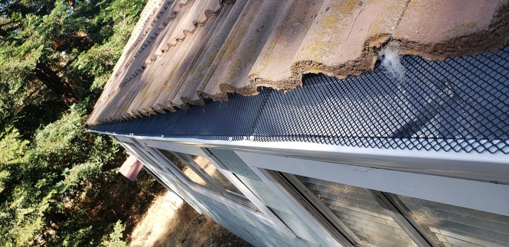 Slide of Gibson Rain Gutters