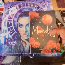 Enchantments - The book I bought and the free calendar. You're not allowed to take pictures or film in the store.