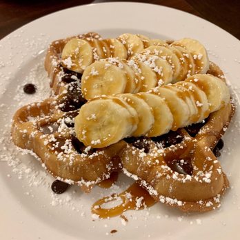 Egg House Cafe - The Banana Choco Caramel Upgraded waffle. - Breakfast & Brunch Near Me - Denton, Texas Egg House Cafe - The Banana Choco Caramel Upgraded waffle. - Breakfast & Brunch Near Me - Denton, Texas