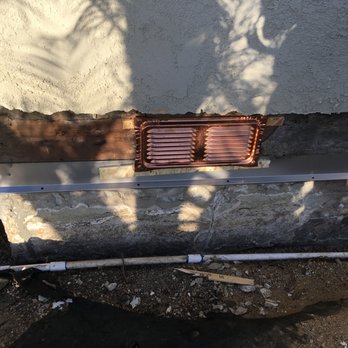 The Plaster Master - copper vent over stainless steel weep screed - General Contractors Near Me