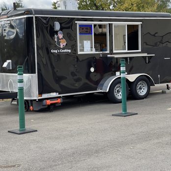 Creg’s Cooking - a food truck parked in a parking lot - Food Trucks Near Me - Jackson, Michigan