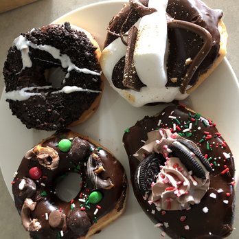 Five-O Donut Co - Oreo, s'mores, peppermint bark, and one more with chocolate pretzel and m&ms. - Donuts Near Me - Sarasota, Florida Five-O Donut Co - Oreo, s'mores, peppermint bark, and one more with chocolate pretzel and m&ms. - Donuts Near Me - Sarasota, Florida