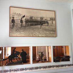 a group of men and a horse
