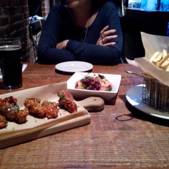 Kings Row Gastropub - Let the noms begin! Wings($10), Brussels sprouts($8), & Kennebec fries($5). - Gastropubs Near Me - Pasadena, California