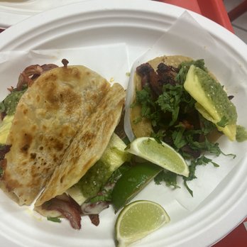 Tacos El Porky - Taco al Pastor and Gringa ( has cheese in a flour tortilla and is cut in half) - Tacos Near Me - Miami, Florida Tacos El Porky - Taco al Pastor and Gringa ( has cheese in a flour tortilla and is cut in half) - Tacos Near Me - Miami, Florida