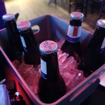 The Office Bar & Grill - six bottles of beer in a cooler - American Near Me - Pasadena, Maryland The Office Bar & Grill - six bottles of beer in a cooler - American Near Me - Pasadena, Maryland
