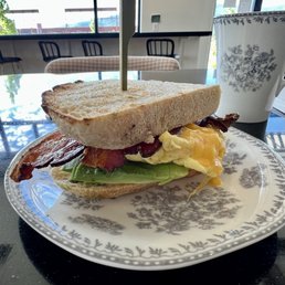 Brekky sandwich (with bacon, on sourdough) and drip coffee.  Highly recommend!