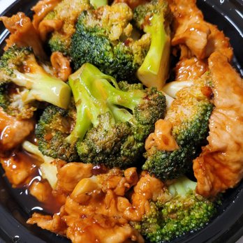 Ollie's To Go - Chicken and broccoli with white rice in garlic sauce - Chinese Near Me - New York, New York Ollie's To Go - Chicken and broccoli with white rice in garlic sauce - Chinese Near Me - New York, New York