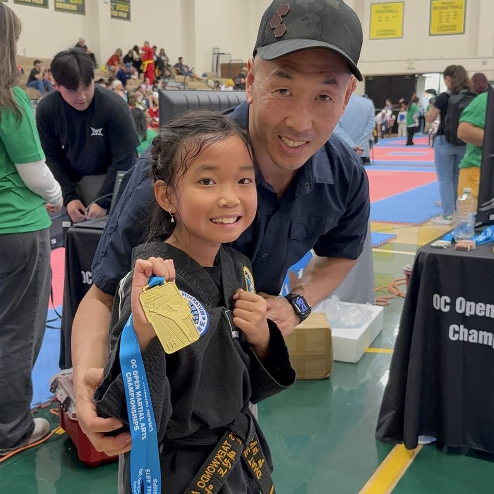 Saga Taekwondo - Kylie won gold at the OC Martial Arts Open Championships tournament. Thank you Master Sa for those weeks of training. - Taekwondo Near Me - Lake Forest, California Saga Taekwondo - Kylie won gold at the OC Martial Arts Open Championships tournament. Thank you Master Sa for those weeks of training. - Taekwondo Near Me - Lake Forest, California
