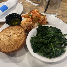 Reconstructed Lobster Roll Connecticut style with gluten free bun and unspiced spinach. Reconstructed Lobster Roll Connecticut style with gluten free bun and unspiced spinach.