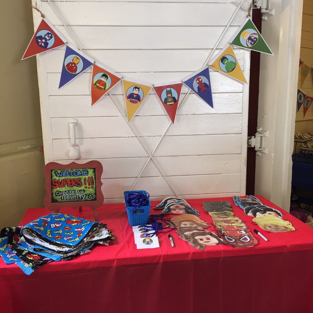 Brickspace Steam Lab and Lego Creativity Center - One of the tables provided where I setup my super heroes banner, tags, masks, and bandanas for guests - Preschools Near Me - Benicia, California