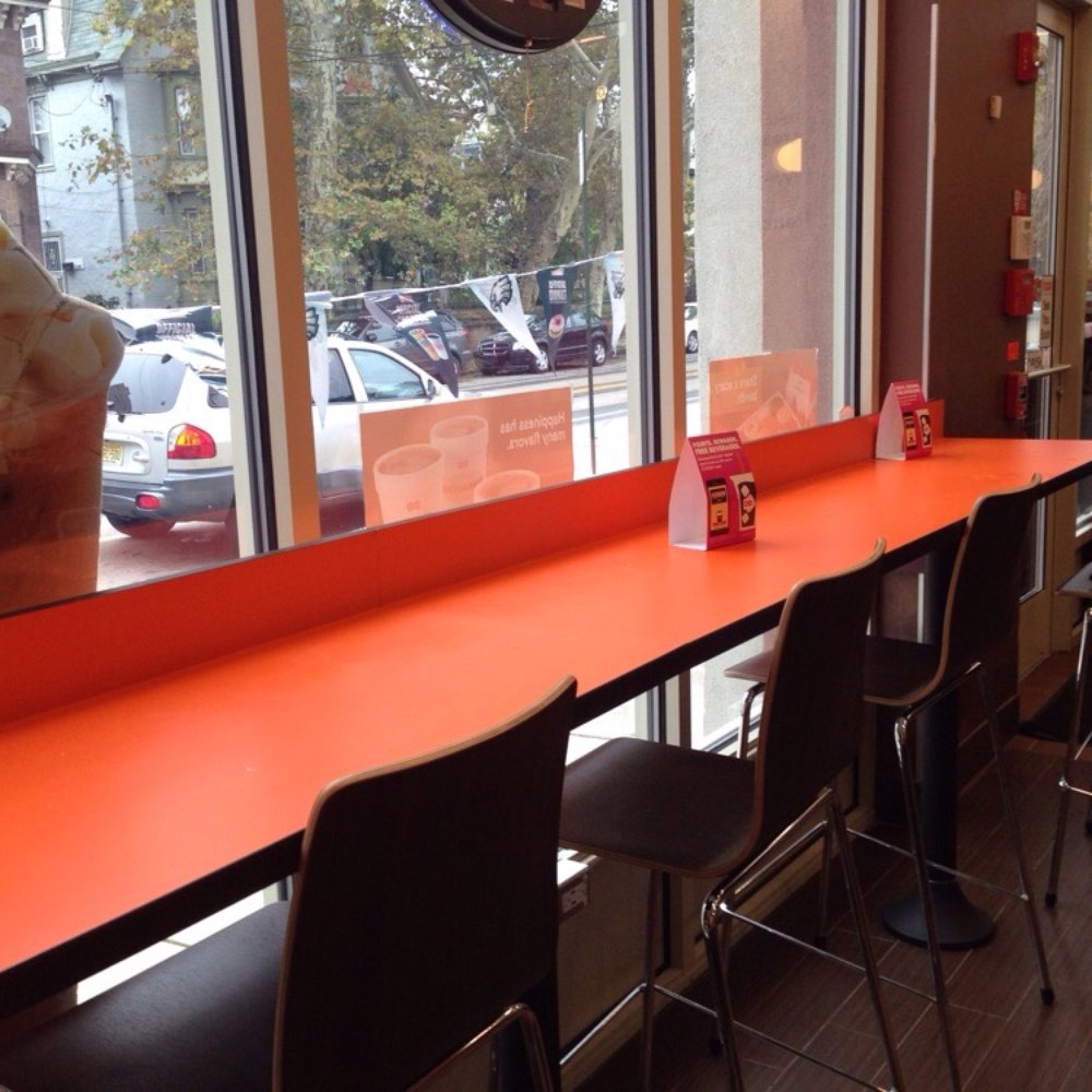Dunkin' - a row of chairs in front of a window - Coffee & Tea Near Me - Philadelphia, Pennsylvania Dunkin' - a row of chairs in front of a window - Coffee & Tea Near Me - Philadelphia, Pennsylvania
