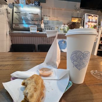 Cafe La Fe - So delicious.  Chicken empanada with cookie crumbs coffee. - Coffee & Tea Near Me - New York, New York