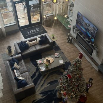 IMT Buckhead on 26th - Leasing office/lounge decorated for Holidays with complementary wrapping station. - Apartments Near Me - Atlanta, Georgia IMT Buckhead on 26th - Leasing office/lounge decorated for Holidays with complementary wrapping station. - Apartments Near Me - Atlanta, Georgia
