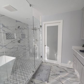 Anyvision Home Remodeling - After: The wet room! Tub and double showers. - General Contractors Near Me - Redmond, Washington Anyvision Home Remodeling - After: The wet room! Tub and double showers. - General Contractors Near Me - Redmond, Washington