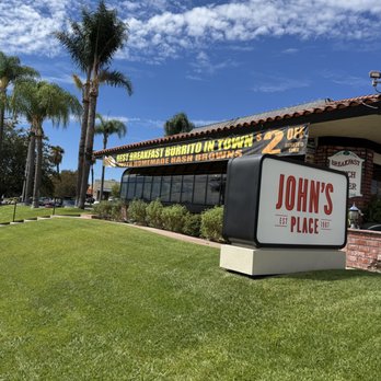John's Place - The indestructible vinyl banner promoting their breakfast burrito has been there since the Covid Era! - American Near Me - Brea, California