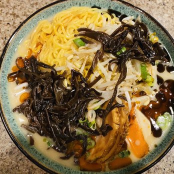 Ramen Utsuke - Tonkotsu Black and Red. The black strips are mushrooms and the orange and black liquids are the oils you add. - Ramen Near Me - Baltimore, Maryland Ramen Utsuke - Tonkotsu Black and Red. The black strips are mushrooms and the orange and black liquids are the oils you add. - Ramen Near Me - Baltimore, Maryland
