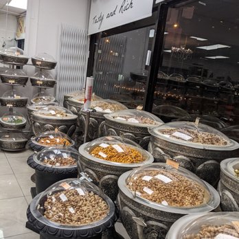 Tavazo - rows of trays of food in a restaurant - Specialty Food Near Me - Toronto, Ontario Tavazo - rows of trays of food in a restaurant - Specialty Food Near Me - Toronto, Ontario