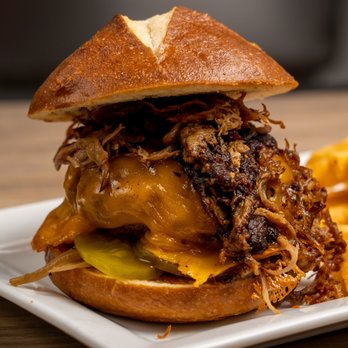 Momma Bear Burgers - a pulled pork sandwich with cheese and pickles - Burgers Near Me - San Antonio, Texas Momma Bear Burgers - a pulled pork sandwich with cheese and pickles - Burgers Near Me - San Antonio, Texas
