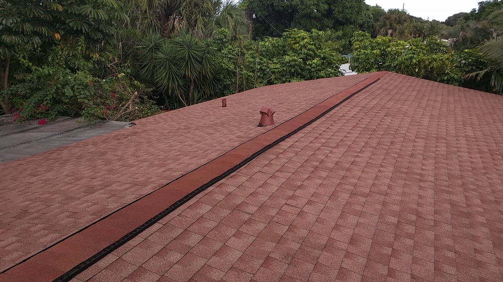 Slide of Riggs Roofing