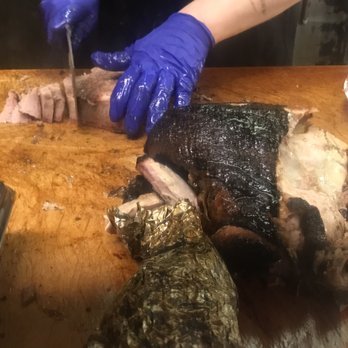 Jack's Bar-B-Que - Cutting some brisket. Note the deliciousness of pulled pork in the foreground. - Barbeque Near Me - Nashville, Tennessee Jack's Bar-B-Que - Cutting some brisket. Note the deliciousness of pulled pork in the foreground. - Barbeque Near Me - Nashville, Tennessee