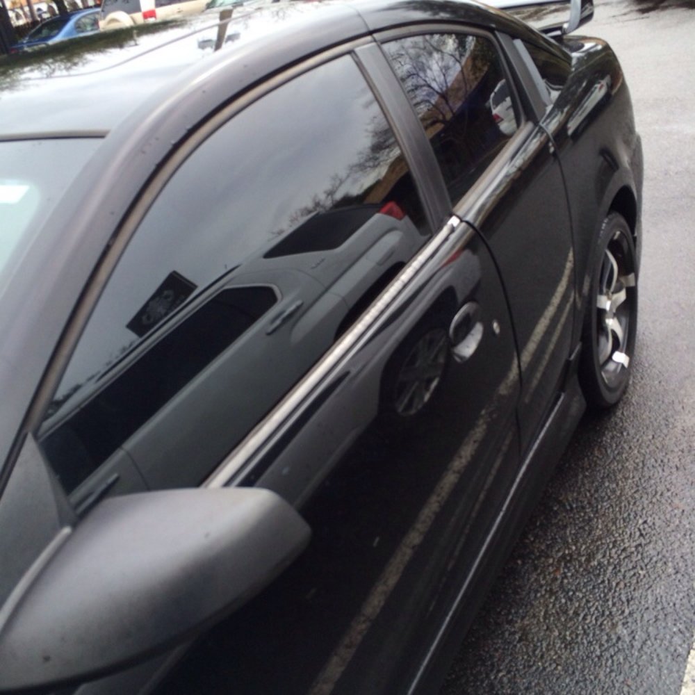Advanced Window Tinting - Completed driver side window, happy. - Home Window Tinting Near Me - Jacksonville, Florida Advanced Window Tinting - Completed driver side window, happy. - Home Window Tinting Near Me - Jacksonville, Florida