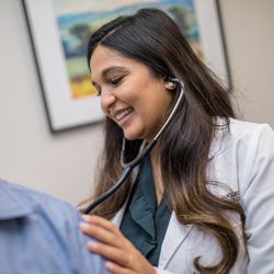 Augusta Oncology - Medical Oncologist Dr. Reena Patel gives an exam to an Augusta Oncology patient.
