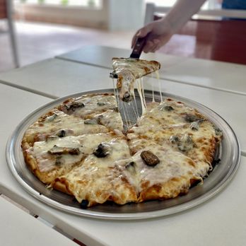 Del Prado Market - Regina Pizza - Tacos Near Me - Aventura, Florida