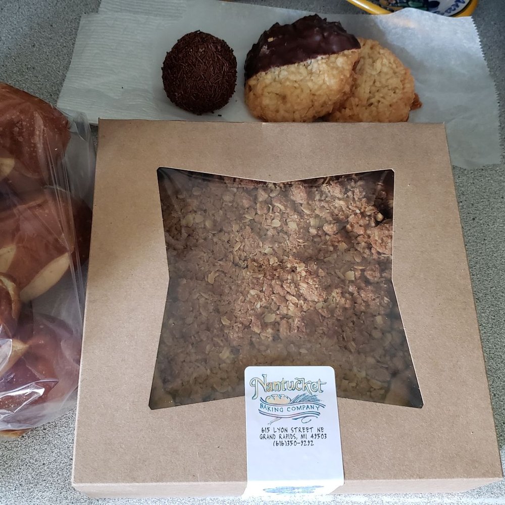 Nantucket Baking - Pretzel buns, blueberry pie, a chocolate cake ball, and 2 coconut macaroons - Bakeries Near Me - Grand Rapids, Michigan Nantucket Baking - Pretzel buns, blueberry pie, a chocolate cake ball, and 2 coconut macaroons - Bakeries Near Me - Grand Rapids, Michigan