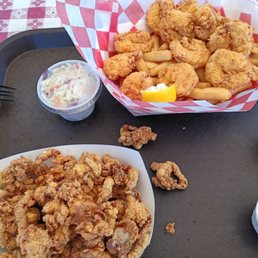 Fried shrimp dinner and fried clam boat. Fried shrimp dinner and fried clam boat.
