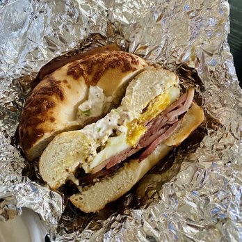 GoodFellas Bagel Deli - "The Don". Ham, bacon, egg, whole grain mustard, garlic & herb cream cheese. This is on a Parmesan bagel. - Breakfast & Brunch Near Me - Lansing, Michigan