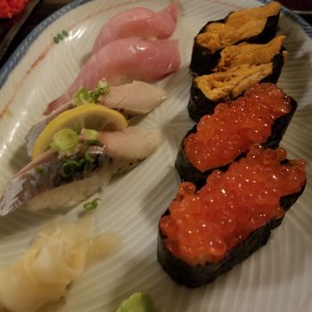 Maneki - Clockwise from the bottom left: pickled mackerel, hamachi, uni, and salmon roe. - Japanese Near Me - Seattle, Washington