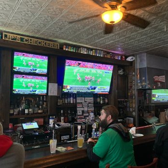 JP's Checkers - a group of people sitting at a bar watching televisions - Bars Near Me - Buffalo, New York JP's Checkers - a group of people sitting at a bar watching televisions - Bars Near Me - Buffalo, New York