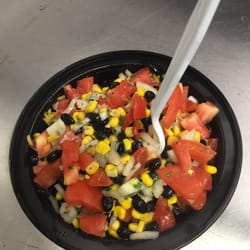Curb Your Appetite - Chicken Rice Bowl: yellow rice topped with chicken cutlet tomato corn black bean onion cilantro salad
