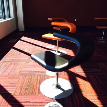 Rodolfo "Corky" Gonzales Branch Library - Very modern and comfortable chairs in the lounge area. - Libraries Near Me - Denver, Colorado