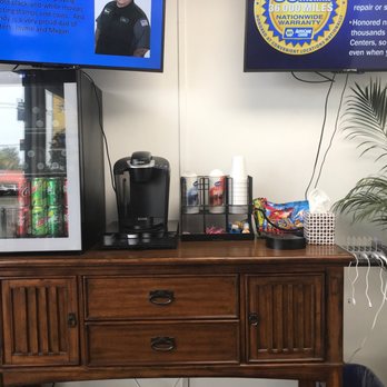John's Automotive Care La Mesa - Snacks, drinks, and chargers for every type of phone in waiting area. - Auto Repair Near Me - La Mesa, California