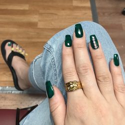 Steve's Spa - Christmas acrylic manicure and polish pedicure.