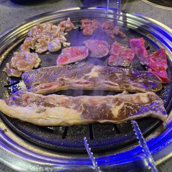 KPOT Korean BBQ & Hot Pot - Our meats grilling - Korean Near Me - Sioux Falls, South Dakota KPOT Korean BBQ & Hot Pot - Our meats grilling - Korean Near Me - Sioux Falls, South Dakota