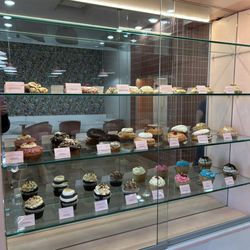 Hey Sugar - Display for the selection of cookies, donuts, cupcakes.
