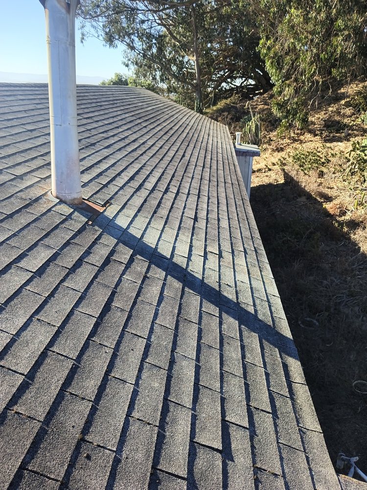 Slide of Rick's Roof & Gutter Cleaning Service